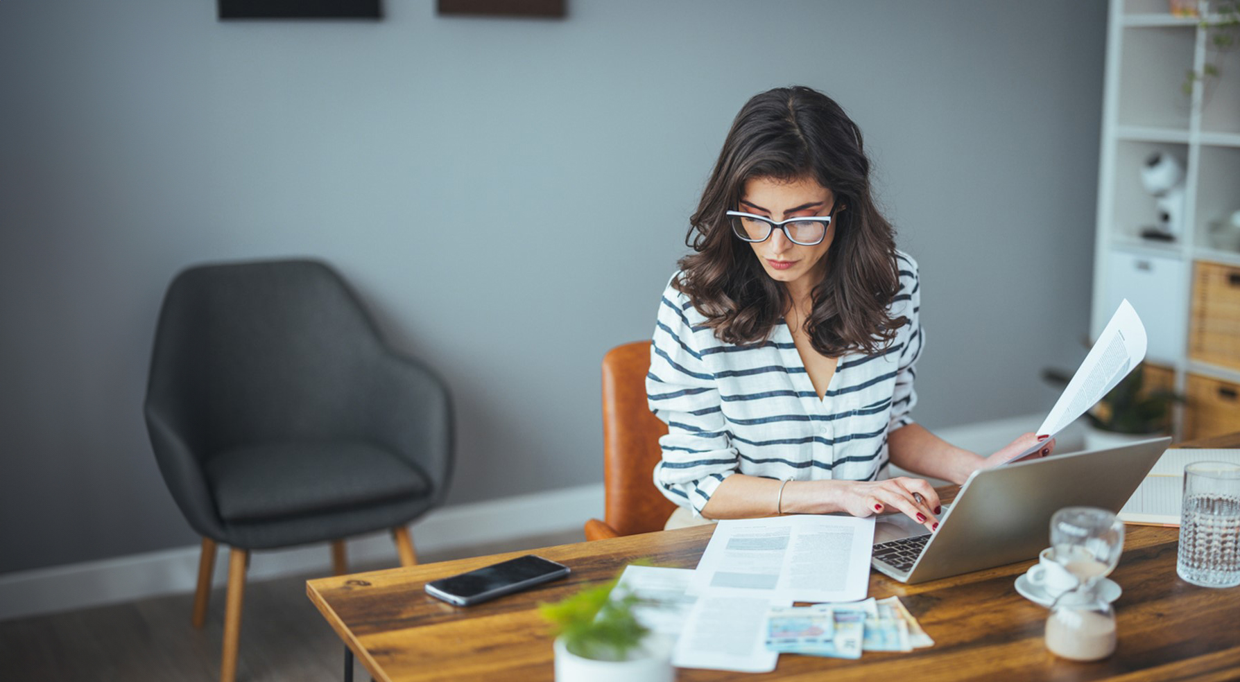 Woman working at home desk