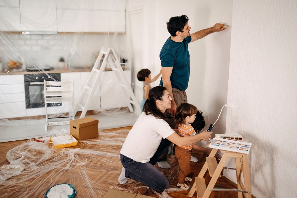 family painting their kitchen