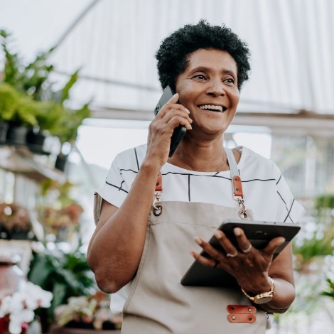 Women on phone with tablet