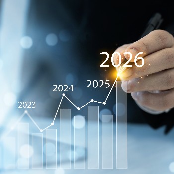 Businessman analyzing financial growth chart for 2026 year.Showing revenue increase, market trends, investment strategy, economic progress, success and future business development in 2026