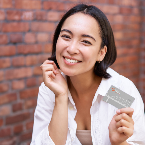 girl holding CW credit card