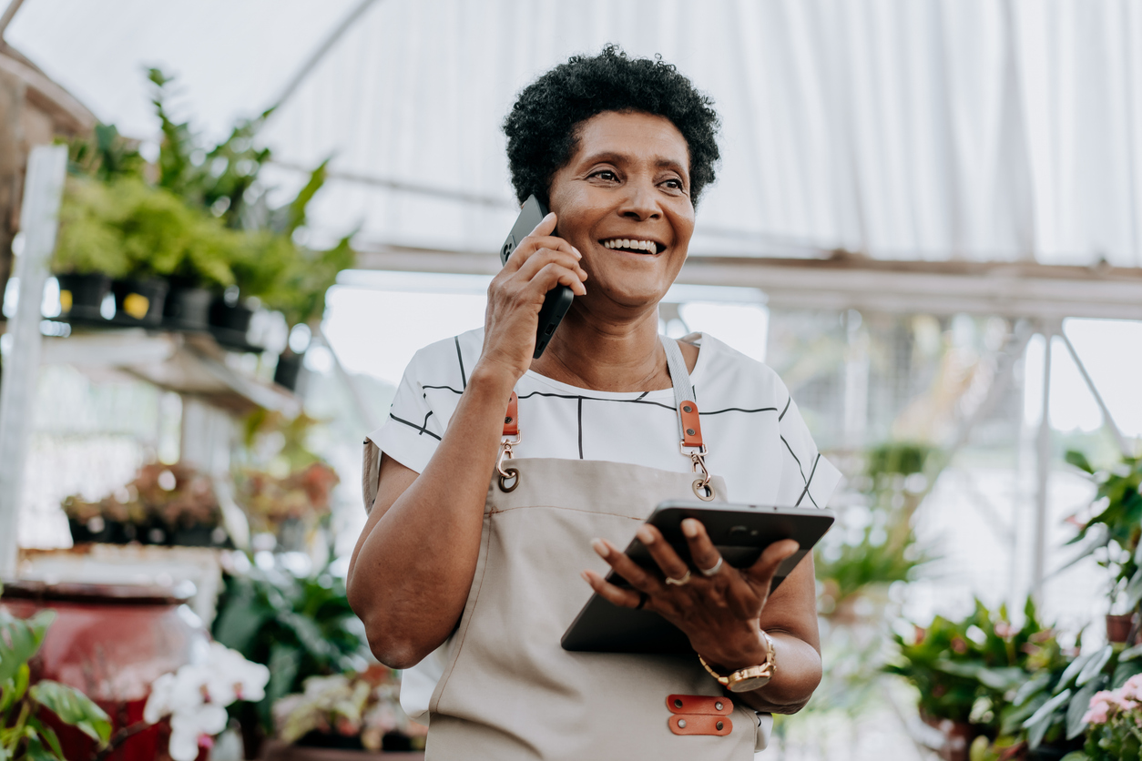 Women on phone with tablet