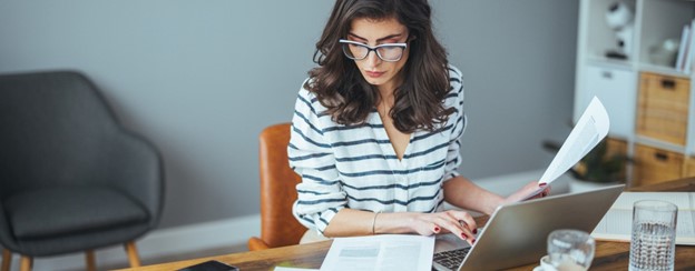 Woman working at home desk