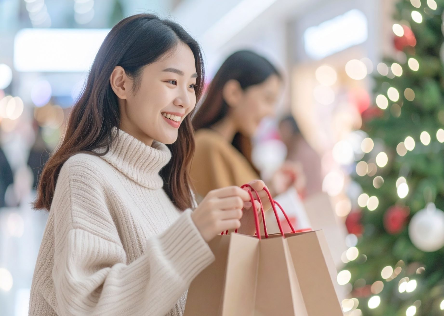 Woman Shopping in Mall with Christmas Decorations. 